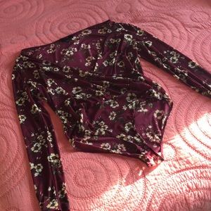 Sheer burgundy floral bodysuit in great condition!